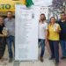 Botella y compañeros del partido junto a la 'papeleta' / FOTO: Unión Portuense