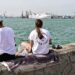 Pescando en la Punta con el muelle de fondo / FOTO: Eulogio García